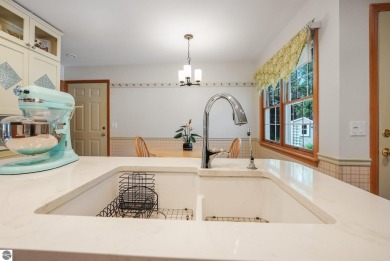 Located just blocks from Lake Michigan and adjacent to Manistee on Manistee Golf and Country Club in Michigan - for sale on GolfHomes.com, golf home, golf lot