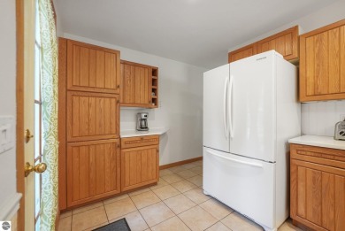 Located just blocks from Lake Michigan and adjacent to Manistee on Manistee Golf and Country Club in Michigan - for sale on GolfHomes.com, golf home, golf lot