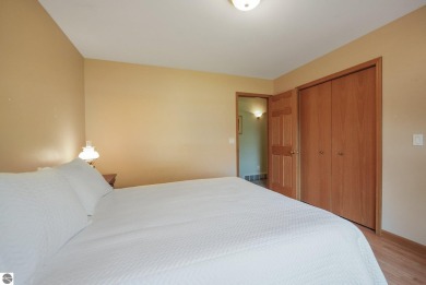 Located just blocks from Lake Michigan and adjacent to Manistee on Manistee Golf and Country Club in Michigan - for sale on GolfHomes.com, golf home, golf lot