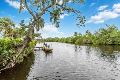 Step into a world of sun-drenched sophistication and carefree on Twin Isles Country Club in Florida - for sale on GolfHomes.com, golf home, golf lot