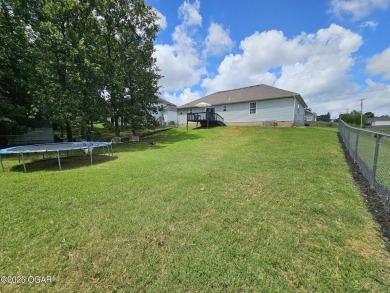 Charming 3-Bedroom, 2-Bath in Desirable Cedar Ridge - Carl on Twin Hills Golf and Country Club in Missouri - for sale on GolfHomes.com, golf home, golf lot