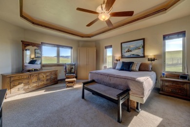 Luxury, comfort, and captivating views come together in this on The Powder Horn Golf Club - Mountain in Wyoming - for sale on GolfHomes.com, golf home, golf lot