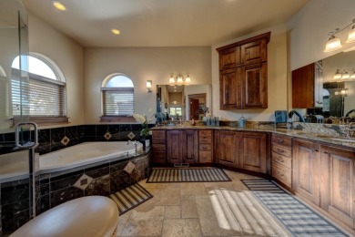 Luxury, comfort, and captivating views come together in this on The Powder Horn Golf Club - Mountain in Wyoming - for sale on GolfHomes.com, golf home, golf lot