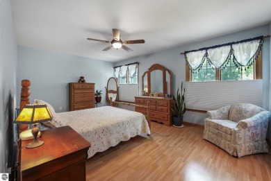 Located just blocks from Lake Michigan and adjacent to Manistee on Manistee Golf and Country Club in Michigan - for sale on GolfHomes.com, golf home, golf lot