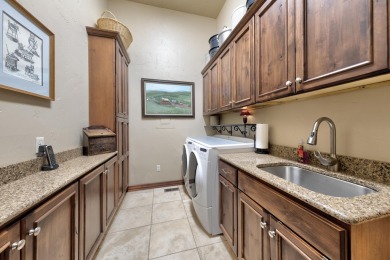 Luxury, comfort, and captivating views come together in this on The Powder Horn Golf Club - Mountain in Wyoming - for sale on GolfHomes.com, golf home, golf lot