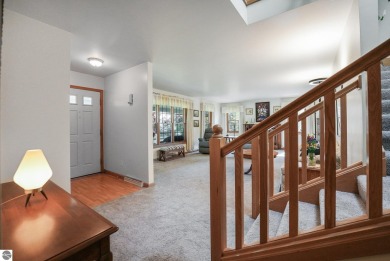 Located just blocks from Lake Michigan and adjacent to Manistee on Manistee Golf and Country Club in Michigan - for sale on GolfHomes.com, golf home, golf lot