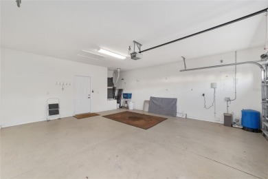 This stunning Coral Gables model was remodeled in 2021-2022 on Eagle Ridge At Spruce Creek Country Club in Florida - for sale on GolfHomes.com, golf home, golf lot