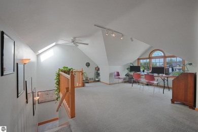 Located just blocks from Lake Michigan and adjacent to Manistee on Manistee Golf and Country Club in Michigan - for sale on GolfHomes.com, golf home, golf lot