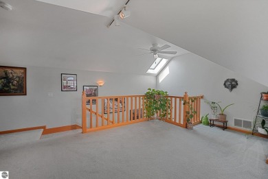 Located just blocks from Lake Michigan and adjacent to Manistee on Manistee Golf and Country Club in Michigan - for sale on GolfHomes.com, golf home, golf lot
