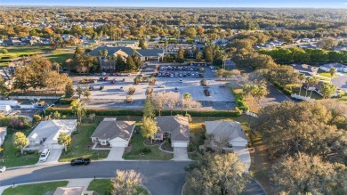 This stunning Coral Gables model was remodeled in 2021-2022 on Eagle Ridge At Spruce Creek Country Club in Florida - for sale on GolfHomes.com, golf home, golf lot