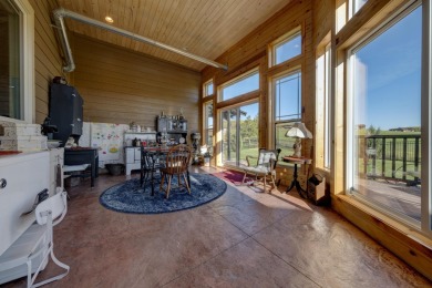 Luxury, comfort, and captivating views come together in this on The Powder Horn Golf Club - Mountain in Wyoming - for sale on GolfHomes.com, golf home, golf lot