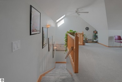 Located just blocks from Lake Michigan and adjacent to Manistee on Manistee Golf and Country Club in Michigan - for sale on GolfHomes.com, golf home, golf lot