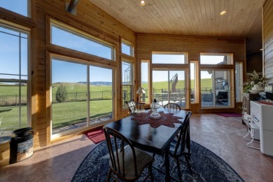 Luxury, comfort, and captivating views come together in this on The Powder Horn Golf Club - Mountain in Wyoming - for sale on GolfHomes.com, golf home, golf lot