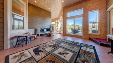 Luxury, comfort, and captivating views come together in this on The Powder Horn Golf Club - Mountain in Wyoming - for sale on GolfHomes.com, golf home, golf lot