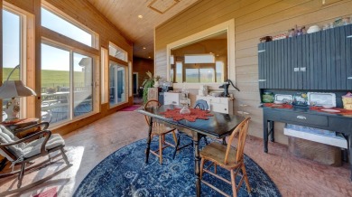 Luxury, comfort, and captivating views come together in this on The Powder Horn Golf Club - Mountain in Wyoming - for sale on GolfHomes.com, golf home, golf lot