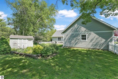 Located just blocks from Lake Michigan and adjacent to Manistee on Manistee Golf and Country Club in Michigan - for sale on GolfHomes.com, golf home, golf lot