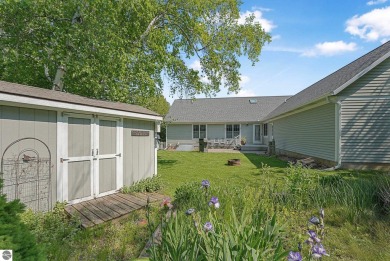 Located just blocks from Lake Michigan and adjacent to Manistee on Manistee Golf and Country Club in Michigan - for sale on GolfHomes.com, golf home, golf lot