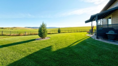 Luxury, comfort, and captivating views come together in this on The Powder Horn Golf Club - Mountain in Wyoming - for sale on GolfHomes.com, golf home, golf lot