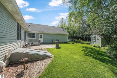 Located just blocks from Lake Michigan and adjacent to Manistee on Manistee Golf and Country Club in Michigan - for sale on GolfHomes.com, golf home, golf lot