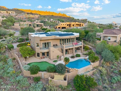 Nestled in the exclusive Solitude Canyon enclave within on Eagle Mountain Golf Club in Arizona - for sale on GolfHomes.com, golf home, golf lot