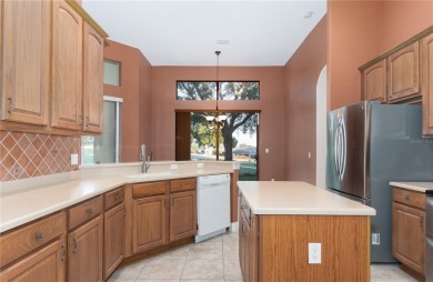 Under contract-accepting backup offers. WOW, ONE OF THE BEST on Harbor Hills Country Club in Florida - for sale on GolfHomes.com, golf home, golf lot