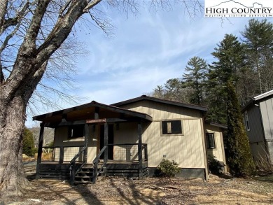 Two bedroom, two bath home renovated in 2023 then flooded in on Land Harbor Golf Course in North Carolina - for sale on GolfHomes.com, golf home, golf lot