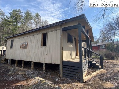 Two bedroom, two bath home renovated in 2023 then flooded in on Land Harbor Golf Course in North Carolina - for sale on GolfHomes.com, golf home, golf lot