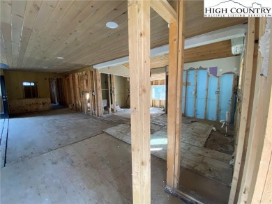 Two bedroom, two bath home renovated in 2023 then flooded in on Land Harbor Golf Course in North Carolina - for sale on GolfHomes.com, golf home, golf lot
