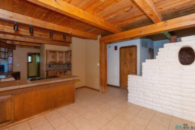Welcome home! This charming 3-bedroom, 2-bath home is full of on Roswell Country Club in New Mexico - for sale on GolfHomes.com, golf home, golf lot
