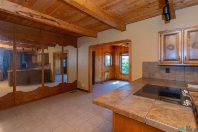 Welcome home! This charming 3-bedroom, 2-bath home is full of on Roswell Country Club in New Mexico - for sale on GolfHomes.com, golf home, golf lot