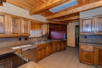 Welcome home! This charming 3-bedroom, 2-bath home is full of on Roswell Country Club in New Mexico - for sale on GolfHomes.com, golf home, golf lot