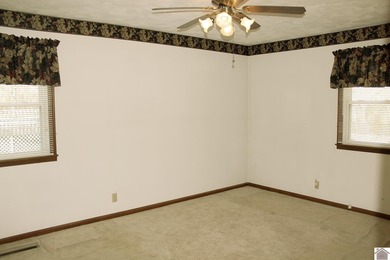 Solid 3BR/2BA ranch home ideally located directly across from on Murray Golf Course, Inc in Kentucky - for sale on GolfHomes.com, golf home, golf lot