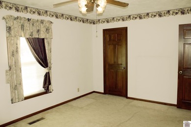 Solid 3BR/2BA ranch home ideally located directly across from on Murray Golf Course, Inc in Kentucky - for sale on GolfHomes.com, golf home, golf lot