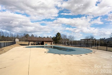Discover the opportunity to build your mountain retreat in on Cummings Cove Golf and Country Club in North Carolina - for sale on GolfHomes.com, golf home, golf lot
