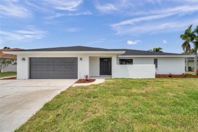 Spectacular golf course remodel! Plenty of room to add pool if on Palm Aire Country Club of Sarasota in Florida - for sale on GolfHomes.com, golf home, golf lot