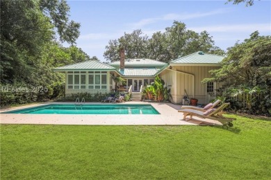 Just steps from the beach, this beautifully maintained 3-bedroom on Port Royal Golf and Racquet Club in South Carolina - for sale on GolfHomes.com, golf home, golf lot