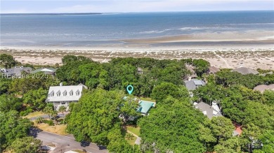 Just steps from the beach, this beautifully maintained 3-bedroom on Port Royal Golf and Racquet Club in South Carolina - for sale on GolfHomes.com, golf home, golf lot