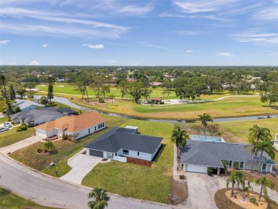 Spectacular golf course remodel! Plenty of room to add pool if on Palm Aire Country Club of Sarasota in Florida - for sale on GolfHomes.com, golf home, golf lot