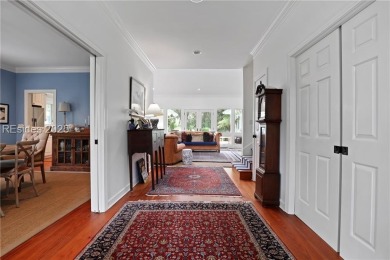 Just steps from the beach, this beautifully maintained 3-bedroom on Port Royal Golf and Racquet Club in South Carolina - for sale on GolfHomes.com, golf home, golf lot