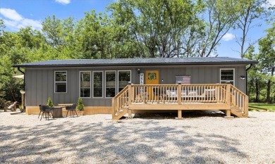 Welcome to your private retreat in the woods! This custom-built on Linn Valley Lakes - Deer Trace Golf Course in Kansas - for sale on GolfHomes.com, golf home, golf lot