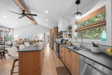 Welcome to your private retreat in the woods! This custom-built on Linn Valley Lakes - Deer Trace Golf Course in Kansas - for sale on GolfHomes.com, golf home, golf lot