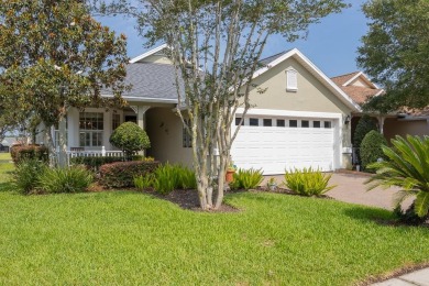 Bright,Cheerful & Immaculate Waterfront Home In Premier 55+ on Slammer and Squire Golf Course in Florida - for sale on GolfHomes.com, golf home, golf lot