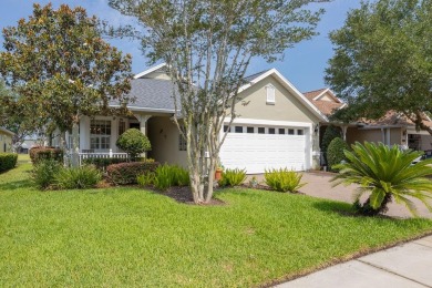 Bright,Cheerful & Immaculate Waterfront Home In Premier 55+ on Slammer and Squire Golf Course in Florida - for sale on GolfHomes.com, golf home, golf lot