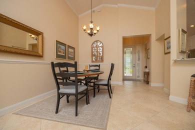 Bright,Cheerful & Immaculate Waterfront Home In Premier 55+ on Slammer and Squire Golf Course in Florida - for sale on GolfHomes.com, golf home, golf lot