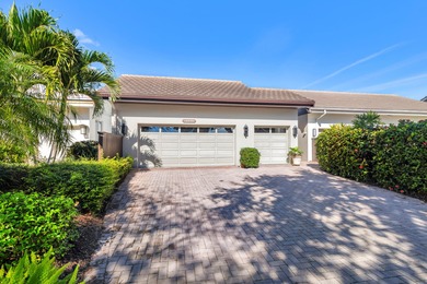 Located on the 14th hole in prestigious Jupiter Hills Village on Jupiter Hills Club in Florida - for sale on GolfHomes.com, golf home, golf lot