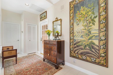 Located on the 14th hole in prestigious Jupiter Hills Village on Jupiter Hills Club in Florida - for sale on GolfHomes.com, golf home, golf lot