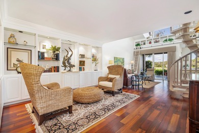 Located on the 14th hole in prestigious Jupiter Hills Village on Jupiter Hills Club in Florida - for sale on GolfHomes.com, golf home, golf lot