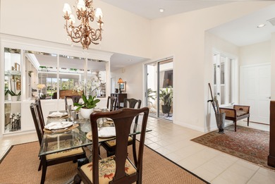 Located on the 14th hole in prestigious Jupiter Hills Village on Jupiter Hills Club in Florida - for sale on GolfHomes.com, golf home, golf lot