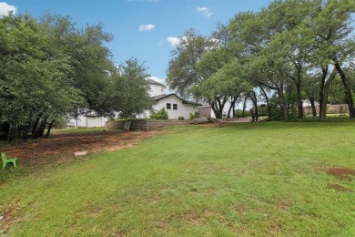Exquisite luxury meets tranquil outdoors with this stunning home on Pecan Plantation Country Club in Texas - for sale on GolfHomes.com, golf home, golf lot