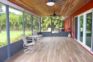 Your own private paradise in this 3/2/2 CBS home in desirable on Martin County Golf Course in Florida - for sale on GolfHomes.com, golf home, golf lot